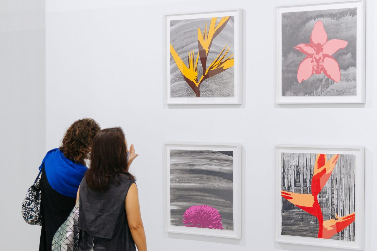 artwork crop 3 From upper left, clockwise: Russel Wong, "Heliconia", "Cymbidium Orchid", "Heliconia Wagneriana", "Chrysanthemum", 2020. Photolithography on paper, edition of 12, 60 x 60 cm, presented by STPI – Creative Workshop & Gallery. Photo by Toni Cuhadi, courtesy of S.E.A. Focus, Singapore