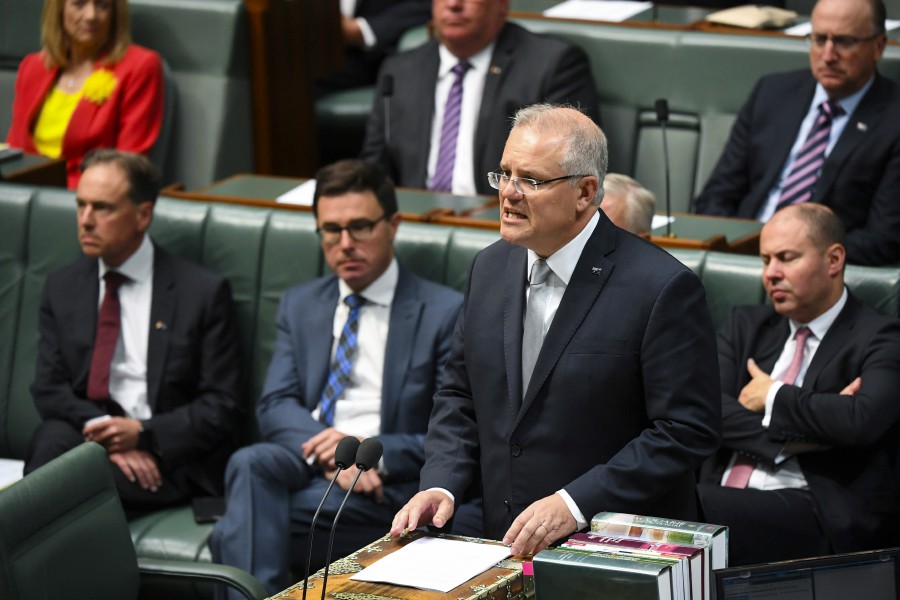 Australian Prime Minister Scott Morrison speaks during the bushfire condolence motion in the House of Representatives at Parliament House in Canberra